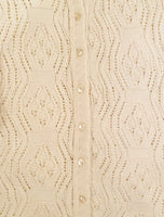 Button-down cream sweater dress detail