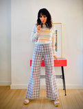 1970s flared plaid pants shown standing