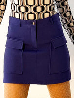 1960s inspired purple miniskirt closeup.